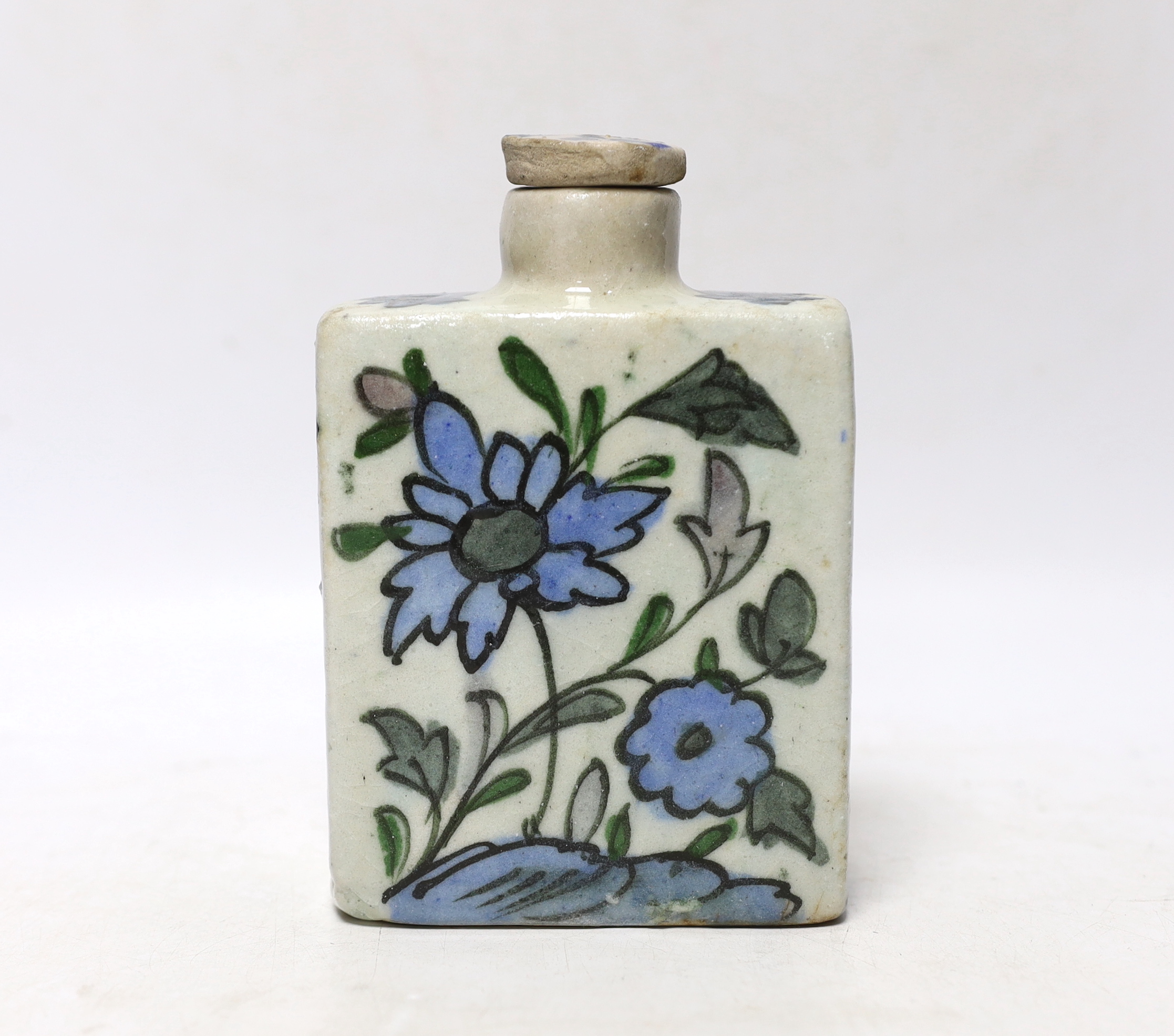 An Iznik tin-glazed pottery flask and cover, 15cm